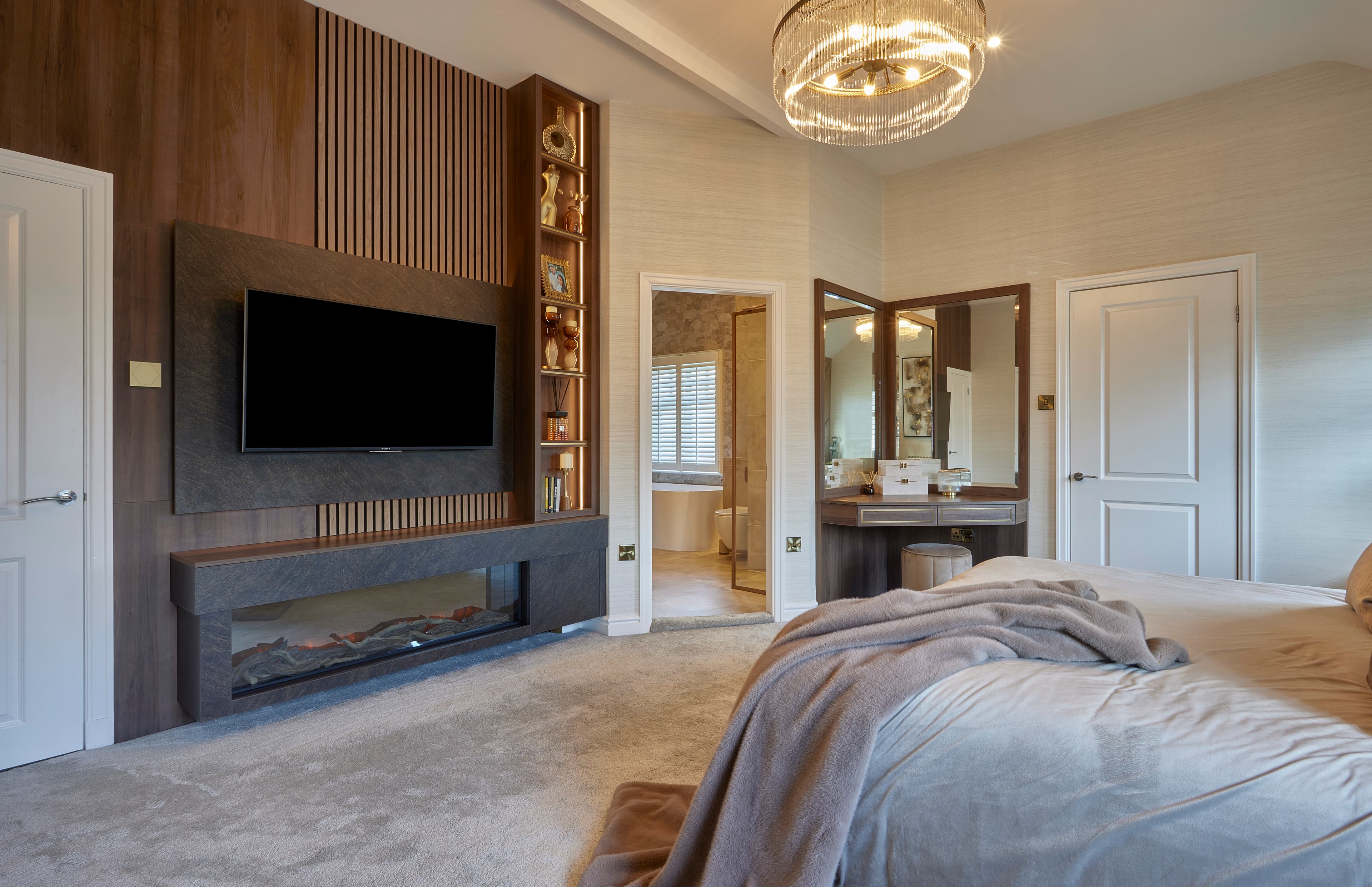 Church Lane bedroom suite with feature fireplace and dressing area by Mia James